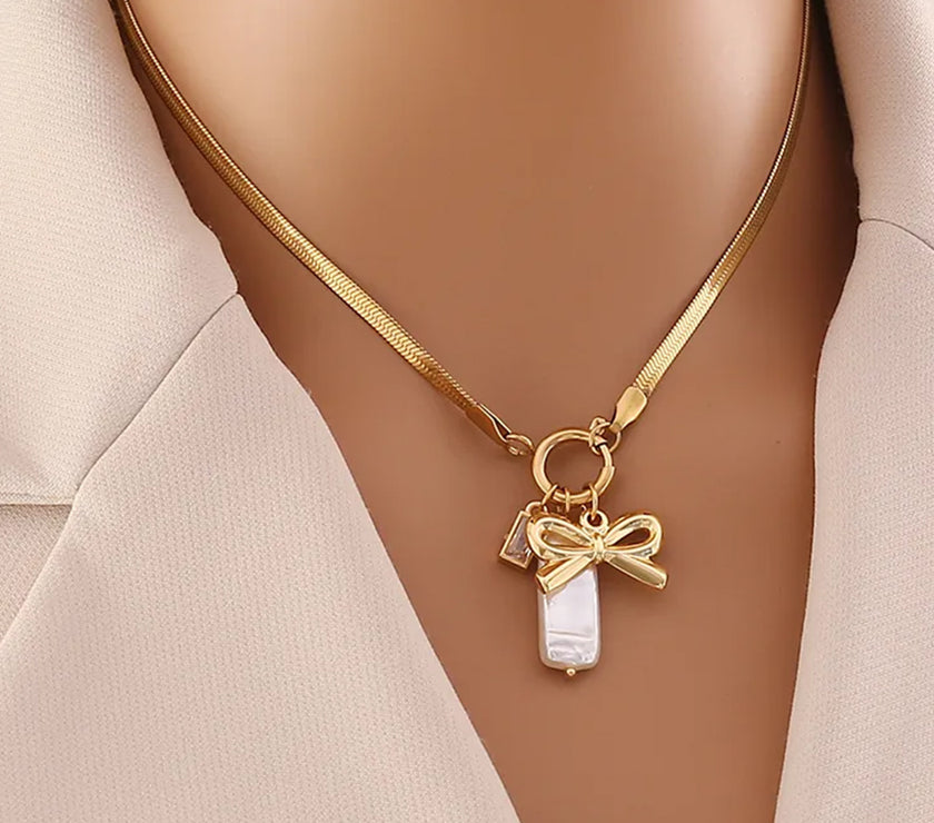 Gold Bow Charm Snake Chain Necklace