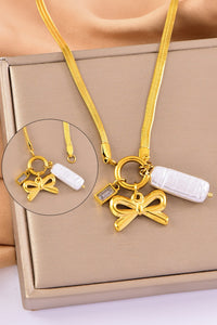 Gold Bow Charm Snake Chain Necklace